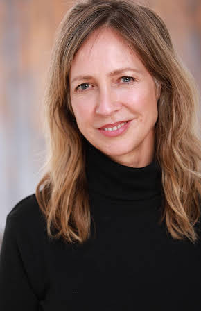 Corinne Bohrer as Julie Riley
