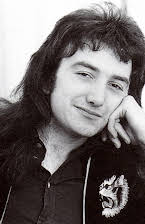 John Deacon as 