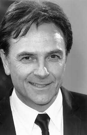 Brian Capron as 