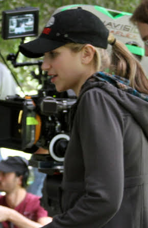 Ali Scher as Director