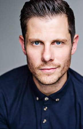 Alastair Natkiel as MC