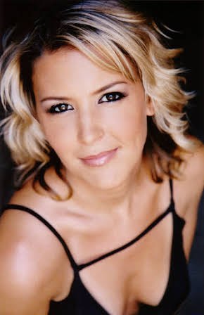 Stacey Scowley as Vicki