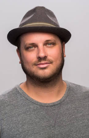 Justin Nesbitt as Director