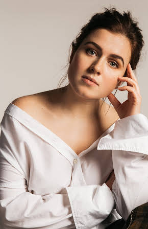 Amy Deasismont as 