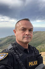 Richard Baxter som Detective Joseph Direnzo