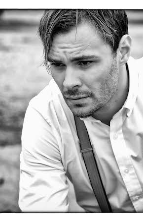 Patrick Flueger as 