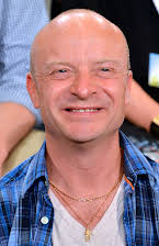 Jonas Gardell som Director