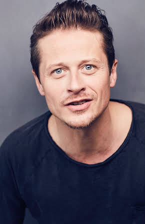 Roman Knizka as 