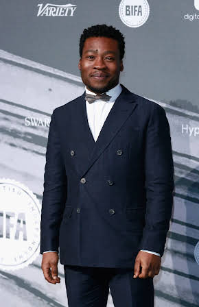 Fisayo Akinade as 