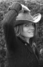 Jericca Cleland som Director