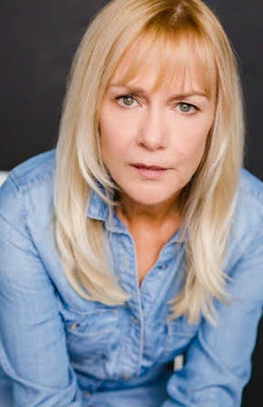 JoAnn Nordstrom as 