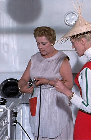 Adrienne Servantie as 