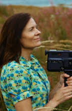 Aslaug Holm as Director