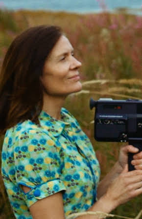 Aslaug Holm as Director