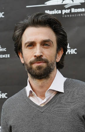 Andrea Scarduzio as 