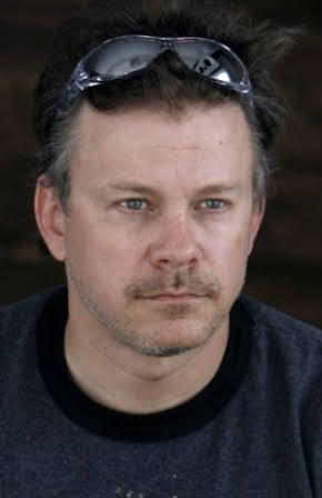 Alain Desrochers as Director