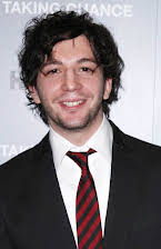 John Magaro as 