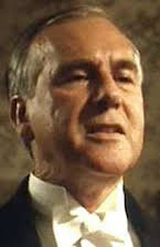 Neville Phillips som Minister