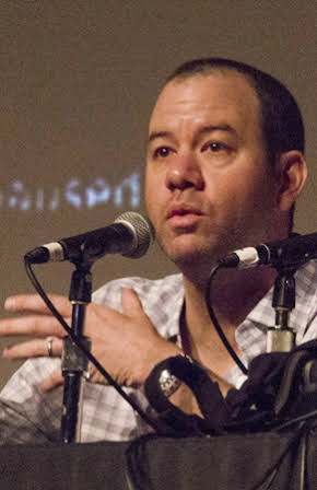 Gregory Plotkin as Director