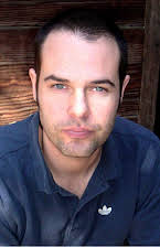 Jacob Aaron Estes as Director