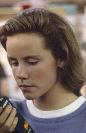Amanda Peterson as 