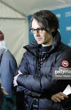 A.J. Eaton as Director