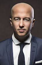 Mani Maserrat Agah som Director