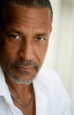 Phil Morris as 