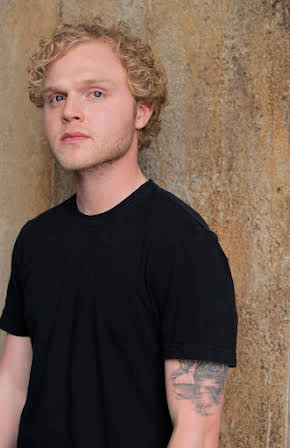 Joe Adler as 