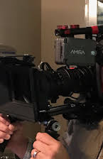 Michael Waxman som Director