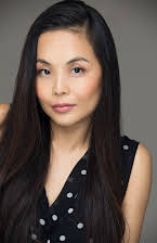 Ryoko Seta as Airport Desk Agent