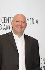 Marc Guggenheim as Director
