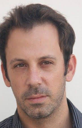 Yona Rozenkier as Director