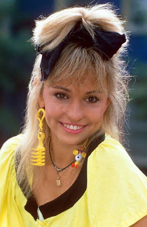 Michaela Strachan as 