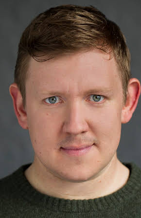 Jamie Baughan as 