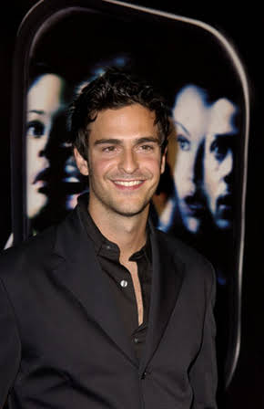 Jonathan Cherry as 