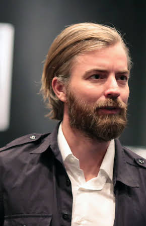 Petter Ringbom as Director