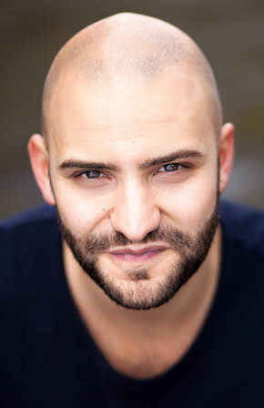 Huw Novelli as 