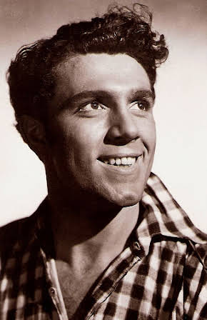 Kieron Moore as 