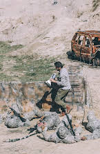 Lance Kawas as Director