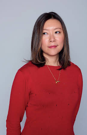 Sandi Tan as Director