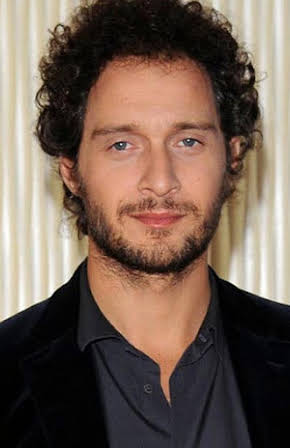 Claudio Santamaria as 