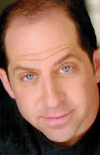 Jason Kravits as 