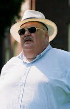 Gailard Sartain como Fulton Norris