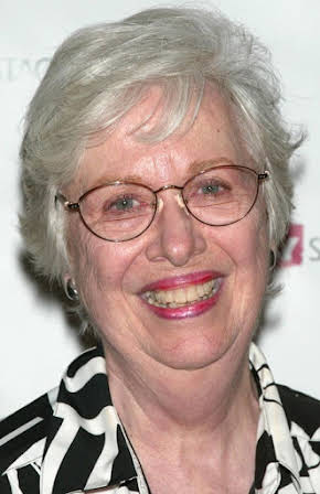 Polly Holliday as 