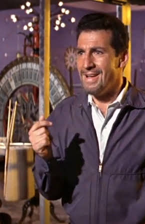 Nicky Blair as Fight Promoter