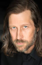 David Lovgren as Curator