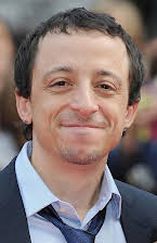 Michael Bacall som Director