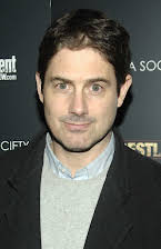 Zach Galligan as 