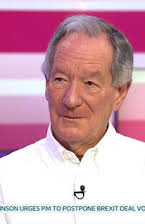 Michael Buerk as 